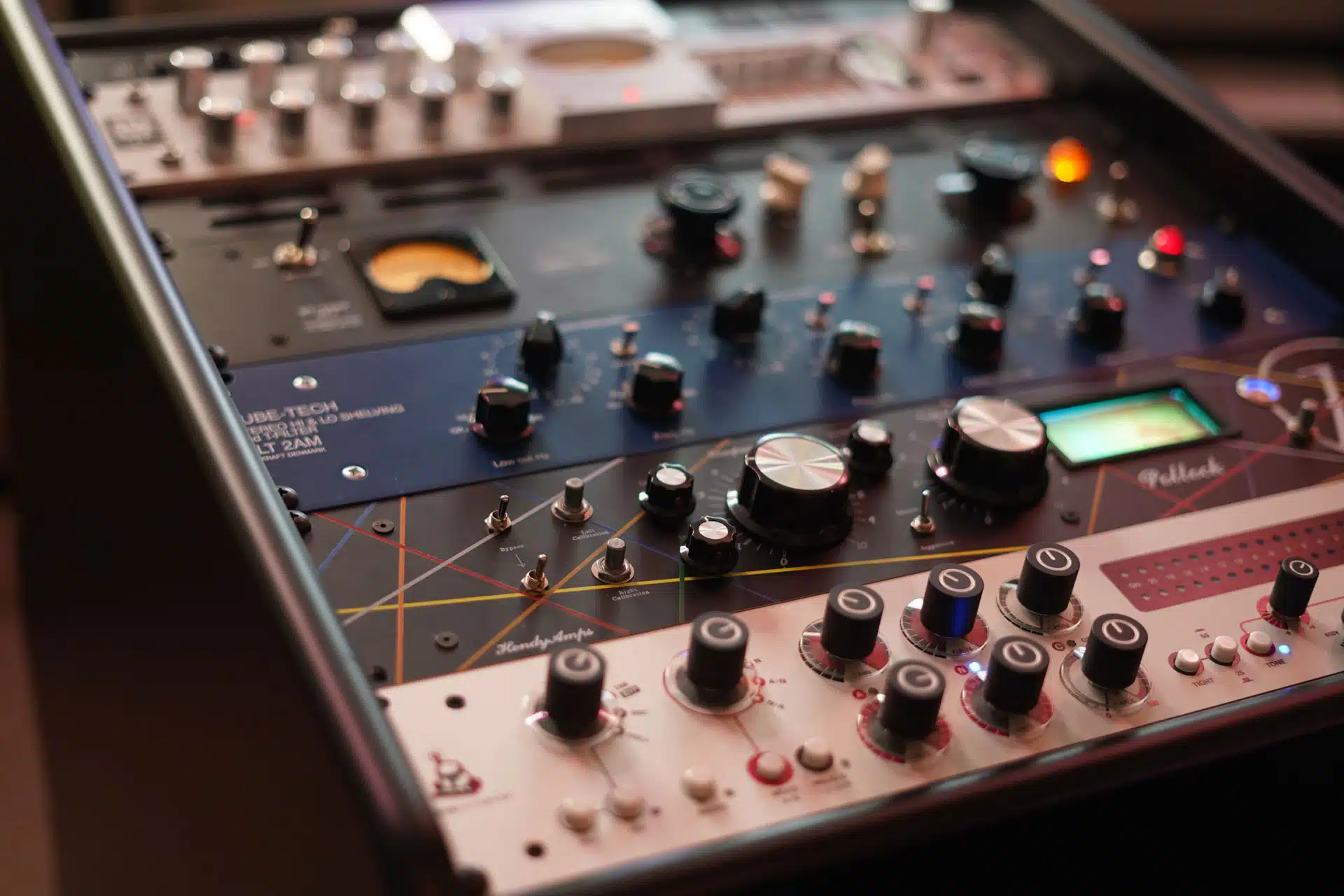 Matty Harris's Los Angeles mixing and mastering studio — console, Kii Three monitors and outboard rack